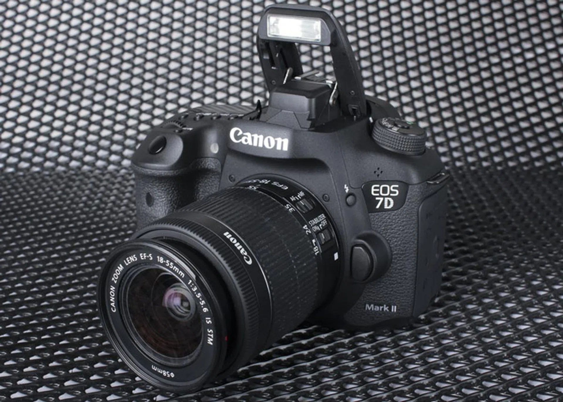 The 7D Mark II comes with a pop-up flash. 