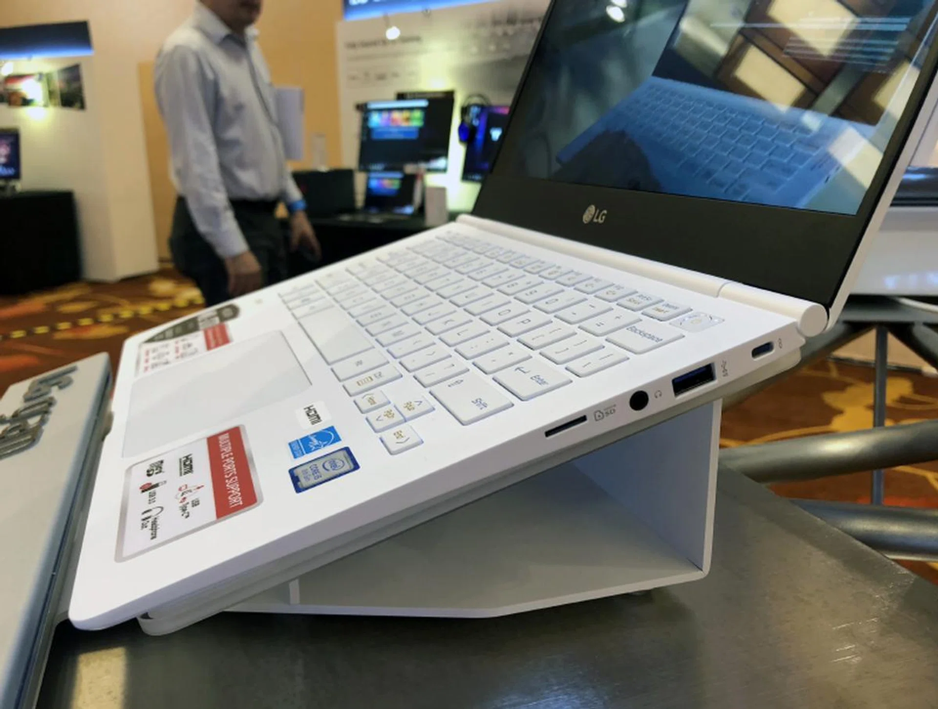 On the right is another USB 3.0 port, headphone jack, micro-SD card reader, and Kensington lock slot.