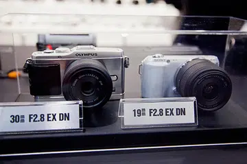 The Sigma DN lenses are available for Micro Four Thirds mounts used in Olympus and Panasonic cameras (left) as well as E-mount for Sony NEX-series of cameras.