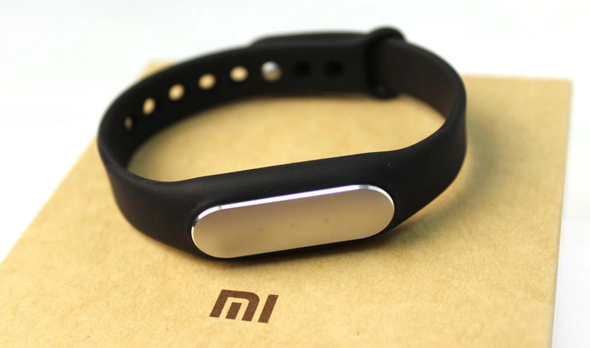 The Mi Band has a sleek aluminum top and comes with a simple but comfortable black rubber wristband.