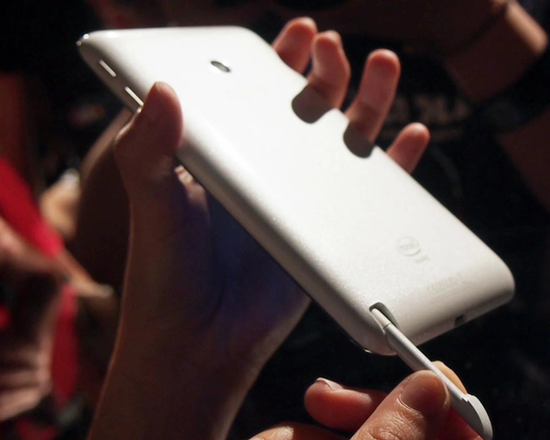 Putting or removing the stylus from its slot seemed easy and smooth from the demonstration.