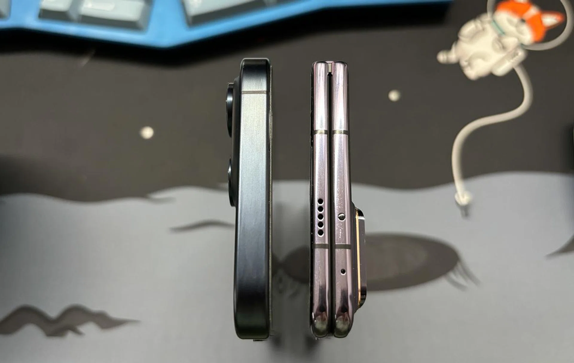 Left to right: iPhone 15 Pro Max, Honor Magic V2.