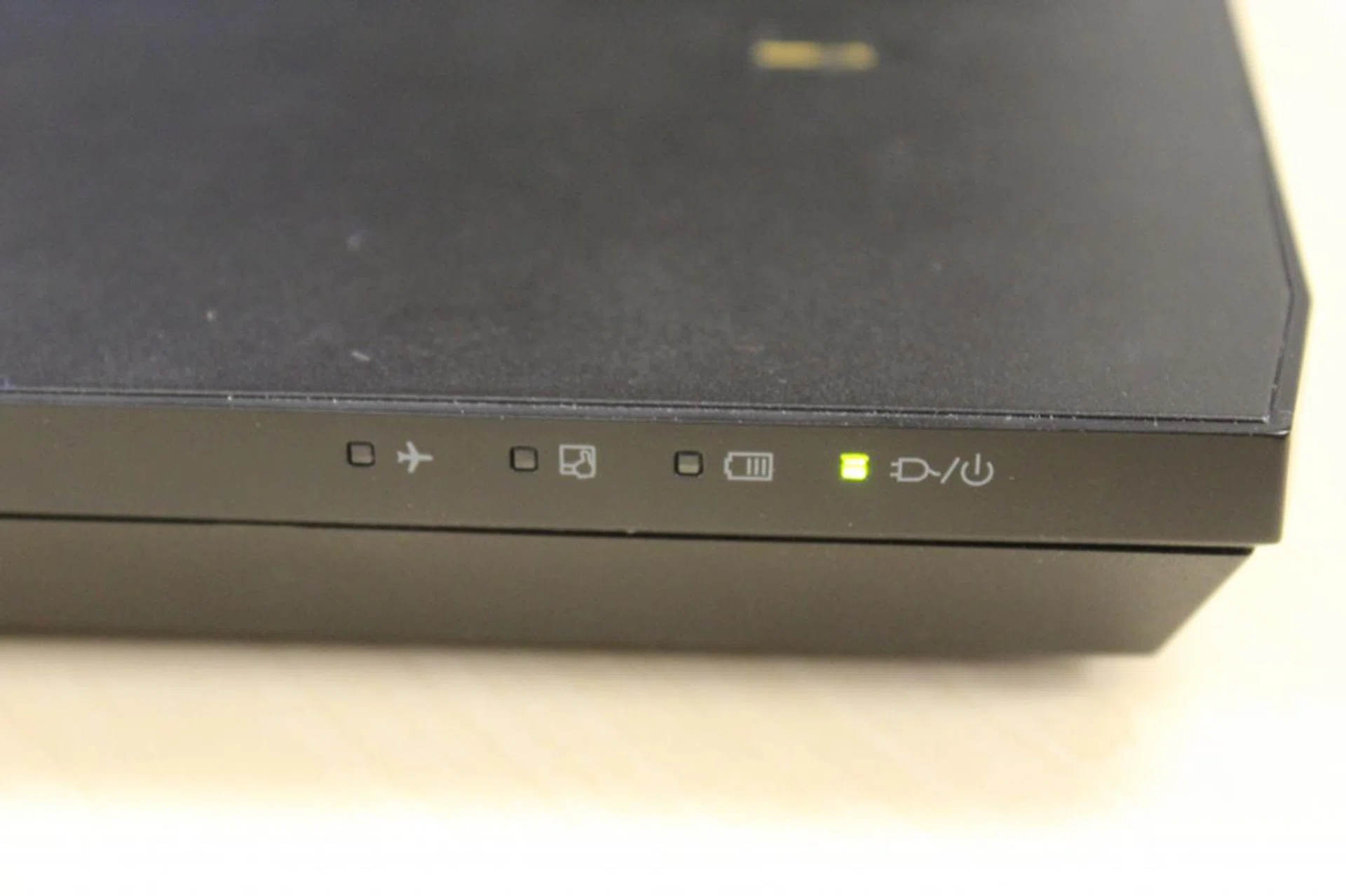 Most of the indicators are on the lower right side of the base. There's the Airplane Mode and trackpad on/off indicators, a battery status indicator and a final one that shows whether the electrical adapter is plugged in and charging. However, you'll have to pay careful attention as the indicators are rather small.