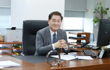 Jong-Hee (JH) Han, Samsung's vice chairman and co-CEO, posing for a picture that announced his CES 2022 appearance. Image: Samsung Hungary.