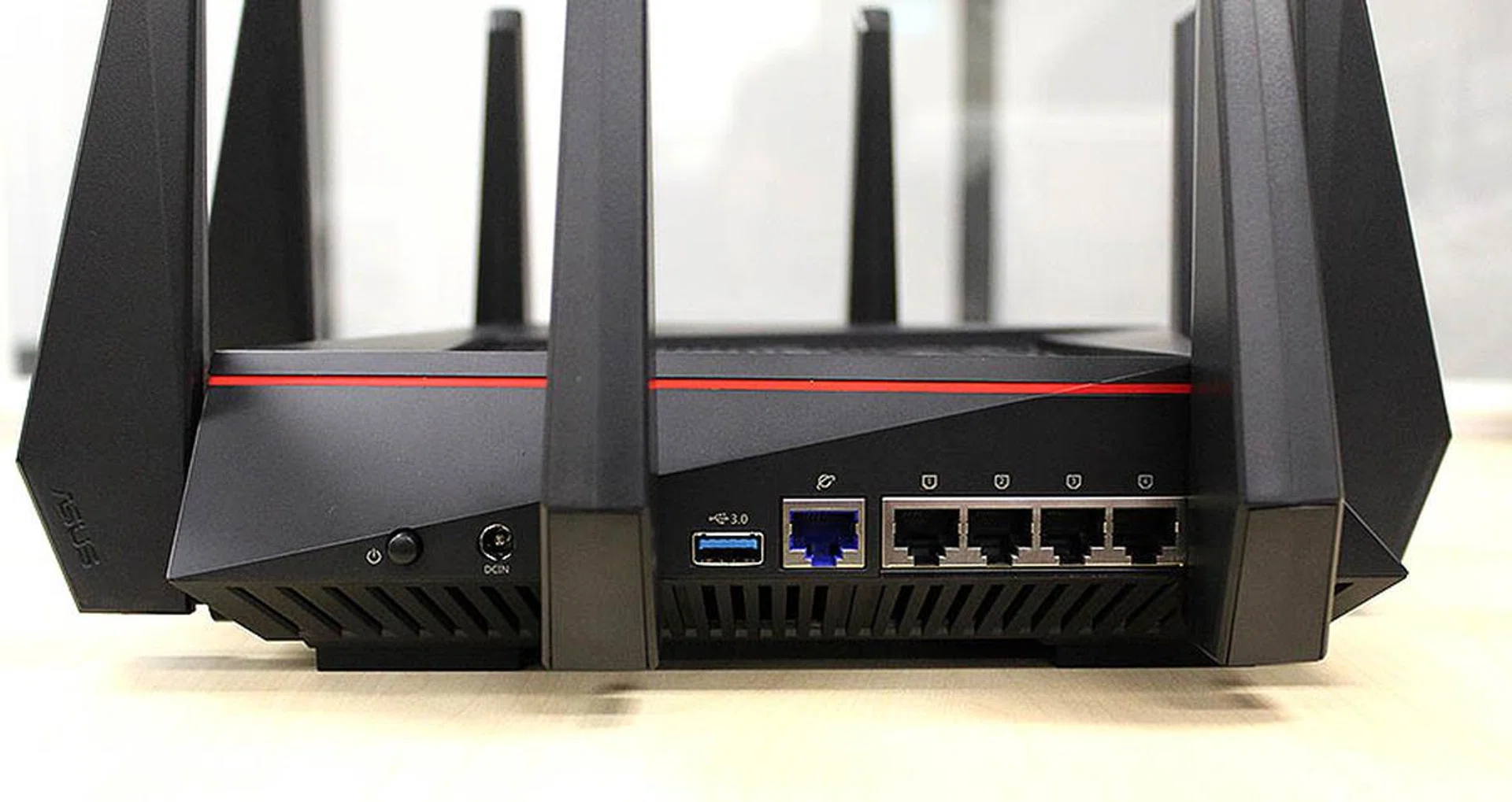 Despite the RT-AC5300 router's size, it only has the usual single Gigabit Ethernet WAN port and four Gigabit Ethernet LAN ports. Note also that there are no LED indicators on the LAN ports.