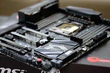 The board is tricked out with carbon fiber finish on the VRM and PCH heatsinks.