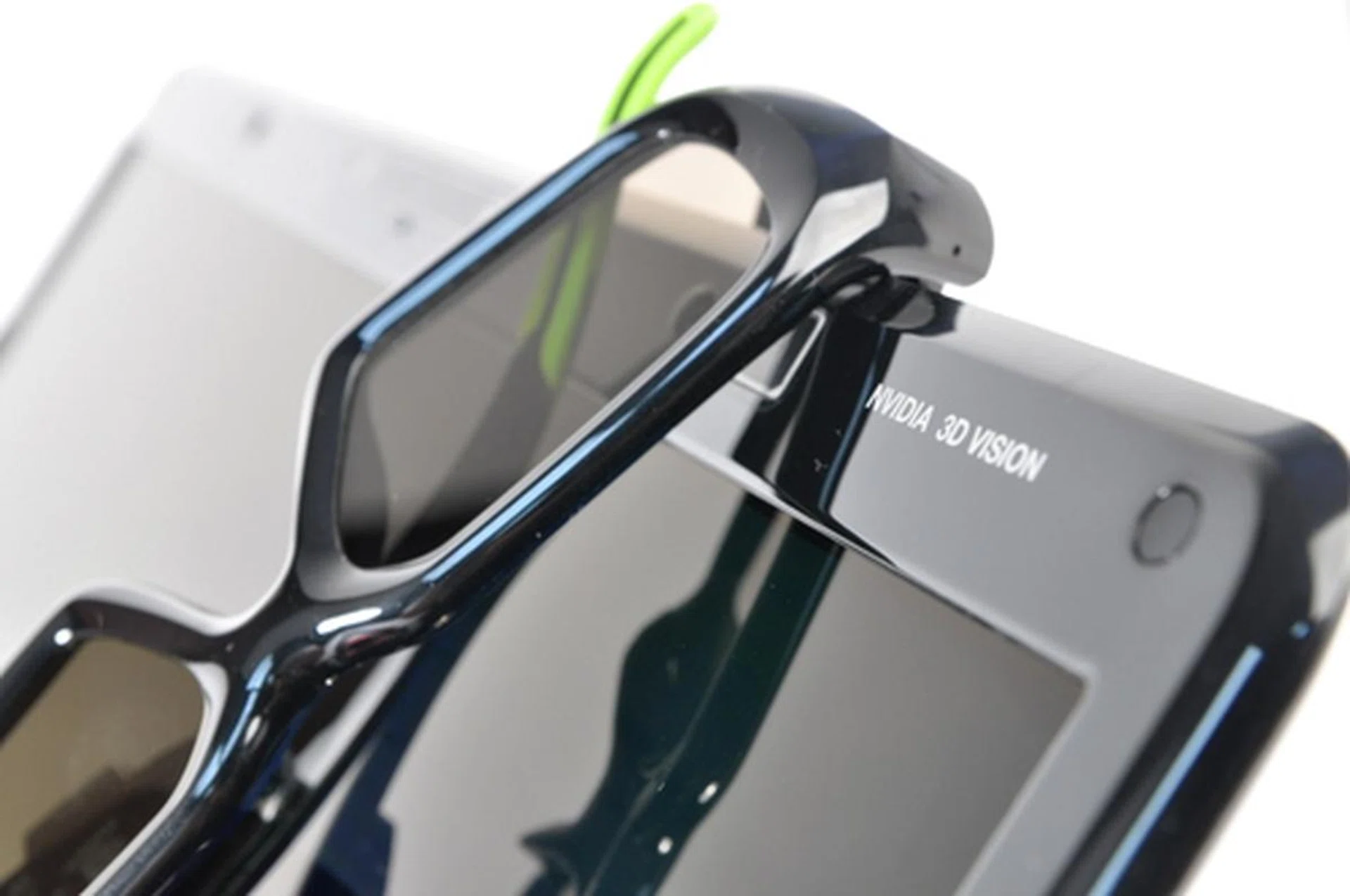 NVIDIA’s support for 3D is found in Toshiba’s latest gaming laptop. Sporty 3D glasses that charge via USB. So that’s why we have so many USB ports!