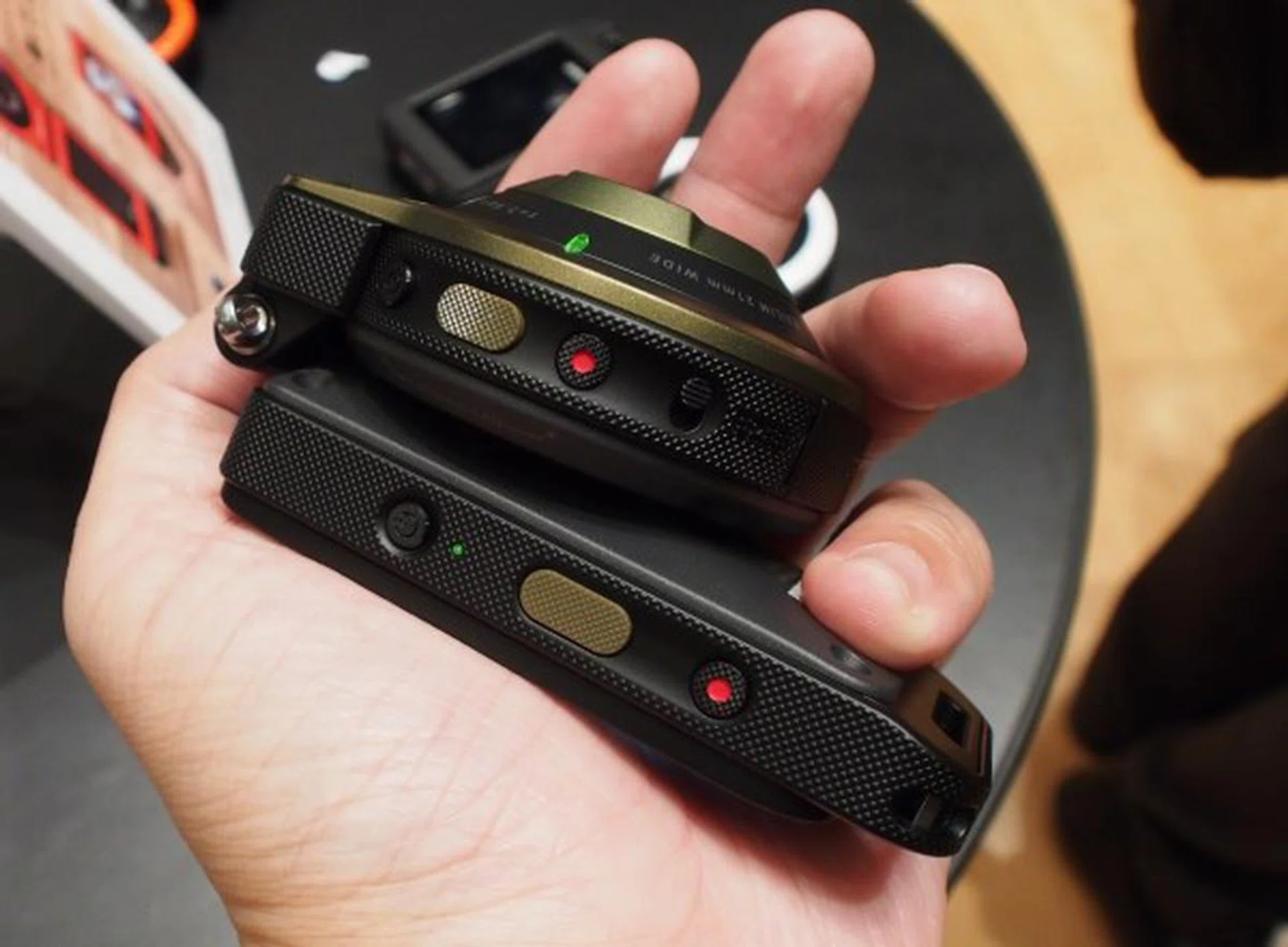 At first glance, the FR10 may seem a little bulky, but it actually fits snugly in the hand. Notice that both the lens and LCD controller have physical power, shutter and record buttons. They are essentially separate devices and the lens unit can operate even without the LCD controller.