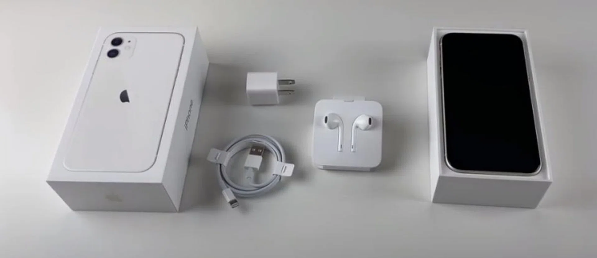 Screenshot taken from the YouTube video "iPhone 11 Unboxing: White!" by Arpine Pog. 