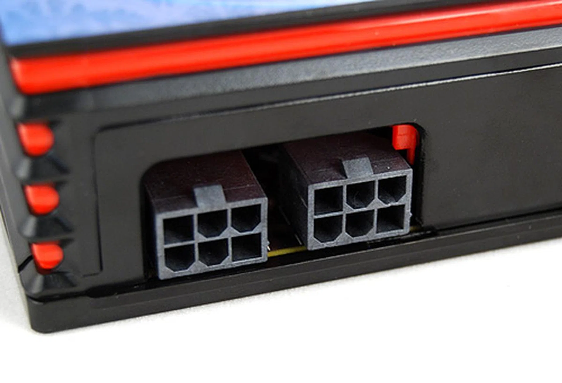 The Radeon HD 6950, on the other hand, gets its power via two 6-pin PCIe power connectors. AMD recommends pairing the card with a PSU rated for at least 550W.