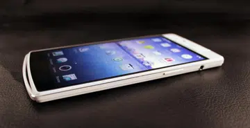 A thick metal band runs around the edge of the phone.