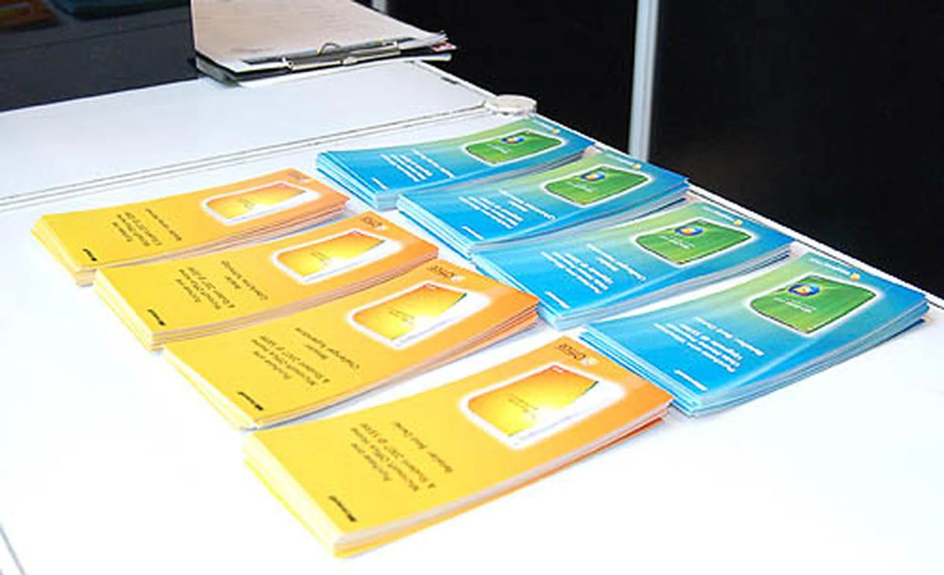  Following the long winding queue to its source, we discovered what all these folks were queuing up for - Microsoft Windows Vista Home Premium Upgrade edition and Microsoft Office Home and Student edition 2007 for only S$99 each. (Editors note: Lighting in the area was dim, but we were surprised at how the coupons seemed to emit a bright white glow in the pictureï¿½)  