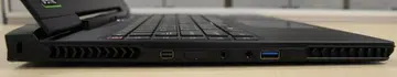 On the left side are the mini-DisplayPort, Surround Port, headphone and mic jacks and a lone USB 3.0 port. The Surround Port is used only for enabling NVIDIA Surround (i.e. output to 3 external displays). 