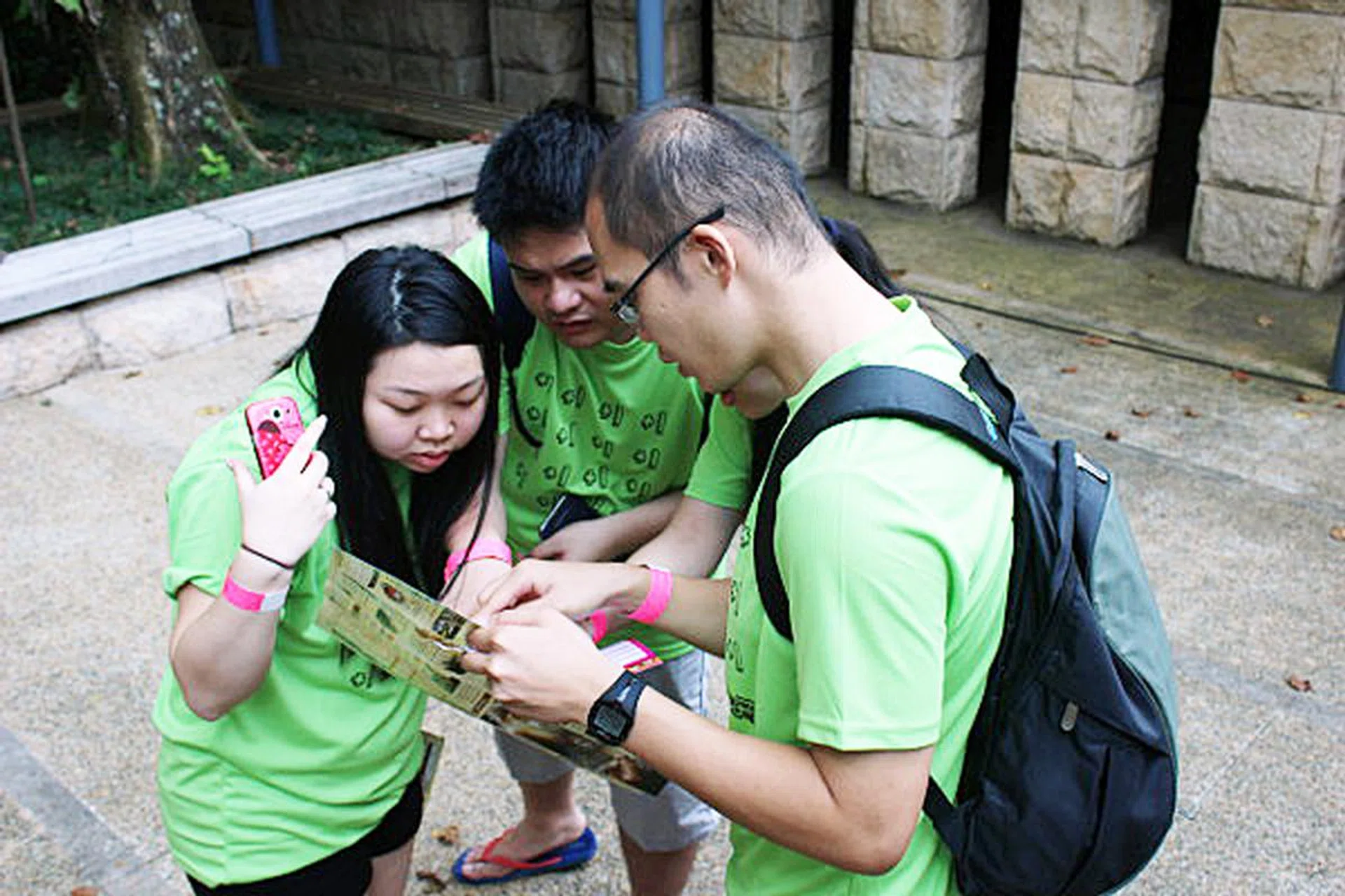 Participants checking out which station their group needed to be at for the first game.