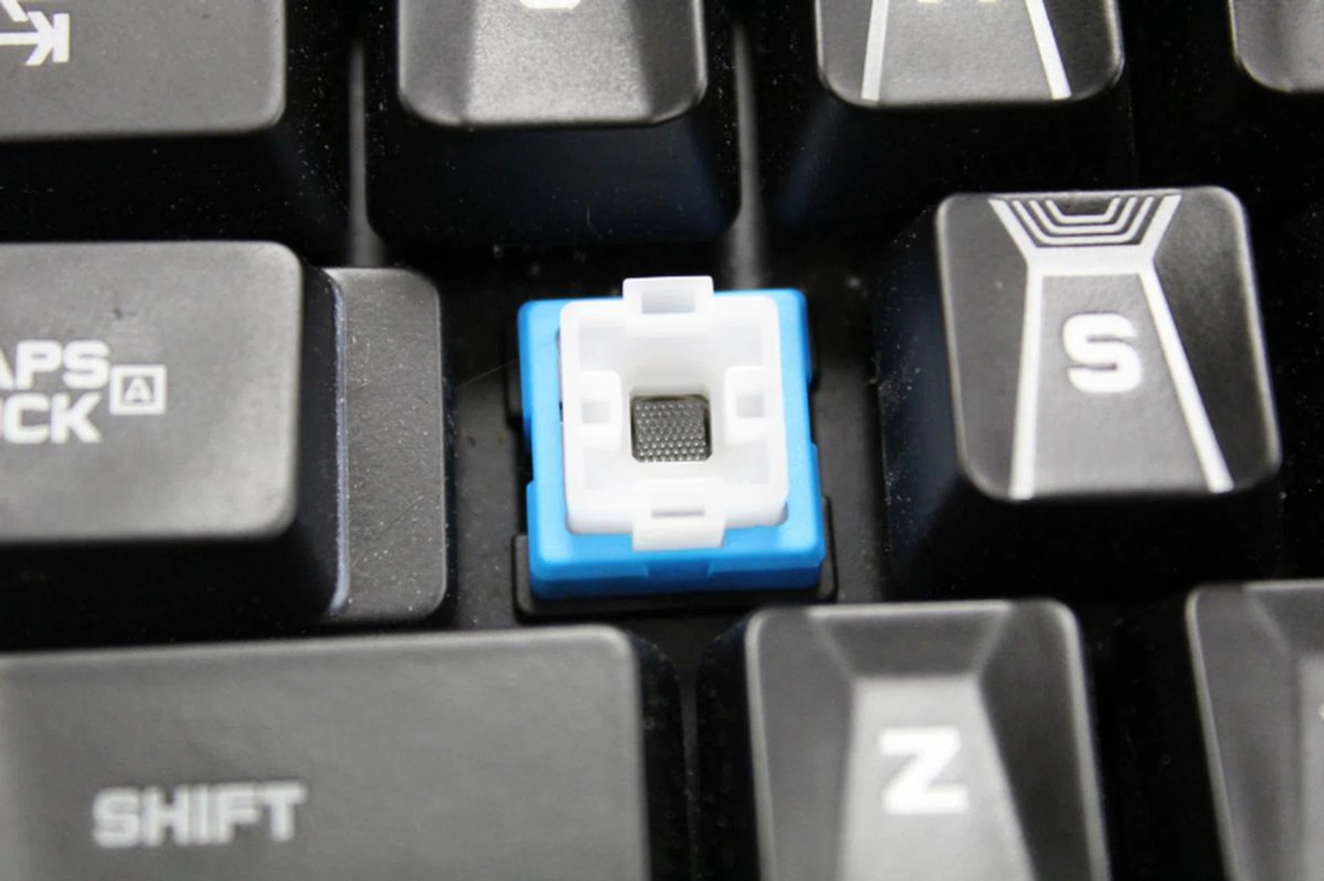You can see that unlike other mechanical keyboards which use stems, the center of a Romer G switch is actually empty.