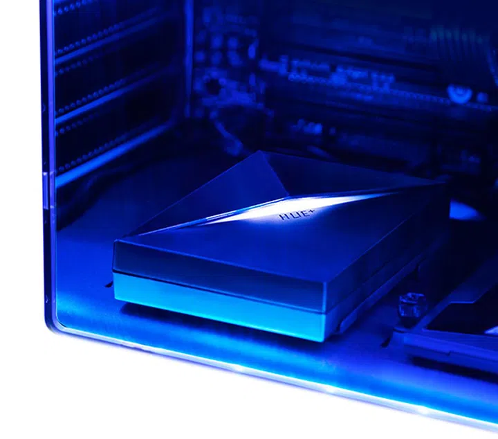 The Hue+ can be installed in any 2.5-inch drive mount, including at the bottom of the case. (Image Source: NZXT)