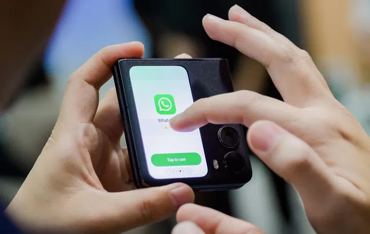 Oppo Find N2 Flip showcasing its compatibility with more apps onboarded to its cover screen during a demo in Shenzhen.