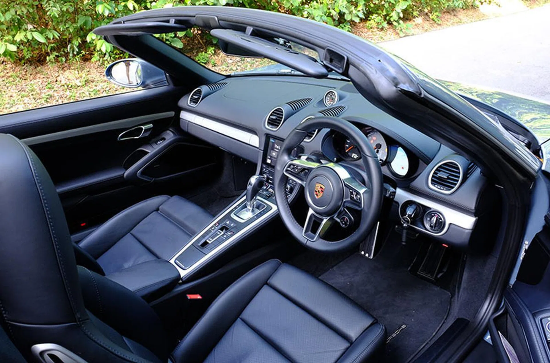 The cabin is sporty and stylish, though, like other Porsches, suffers from having far too many buttons.