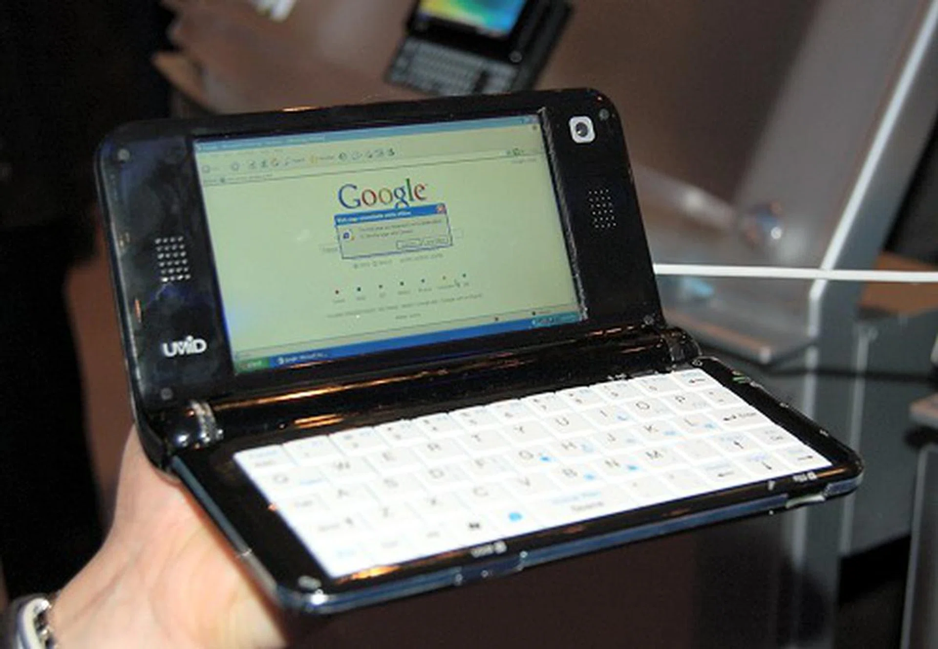  Speaking of the Atom, Intel had a whole line-up of MID devices from its partners that have yet to hit the market. This is the UMID M1. Comes in 512MB/1GB memory capacities, up to 32GB SSD capacity, a 4.8-inch screen (1024 x 600), Wi-Fi, Bluetooth, HSDPA DVB-H, DAB, T-DMB and optional connectivity such as GPS and DVB-T.  
