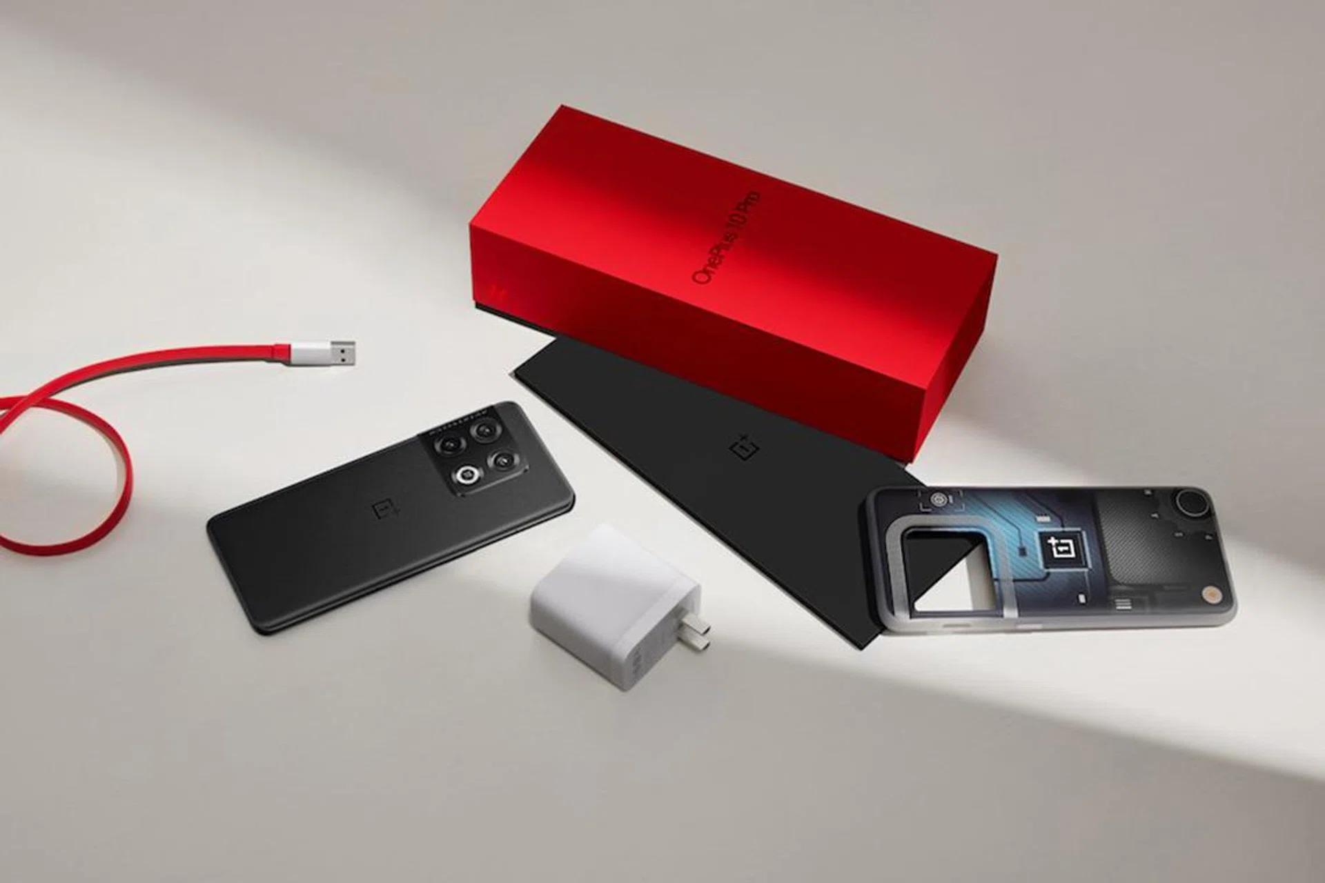 OnePlus 10 Pro with its box and included components.