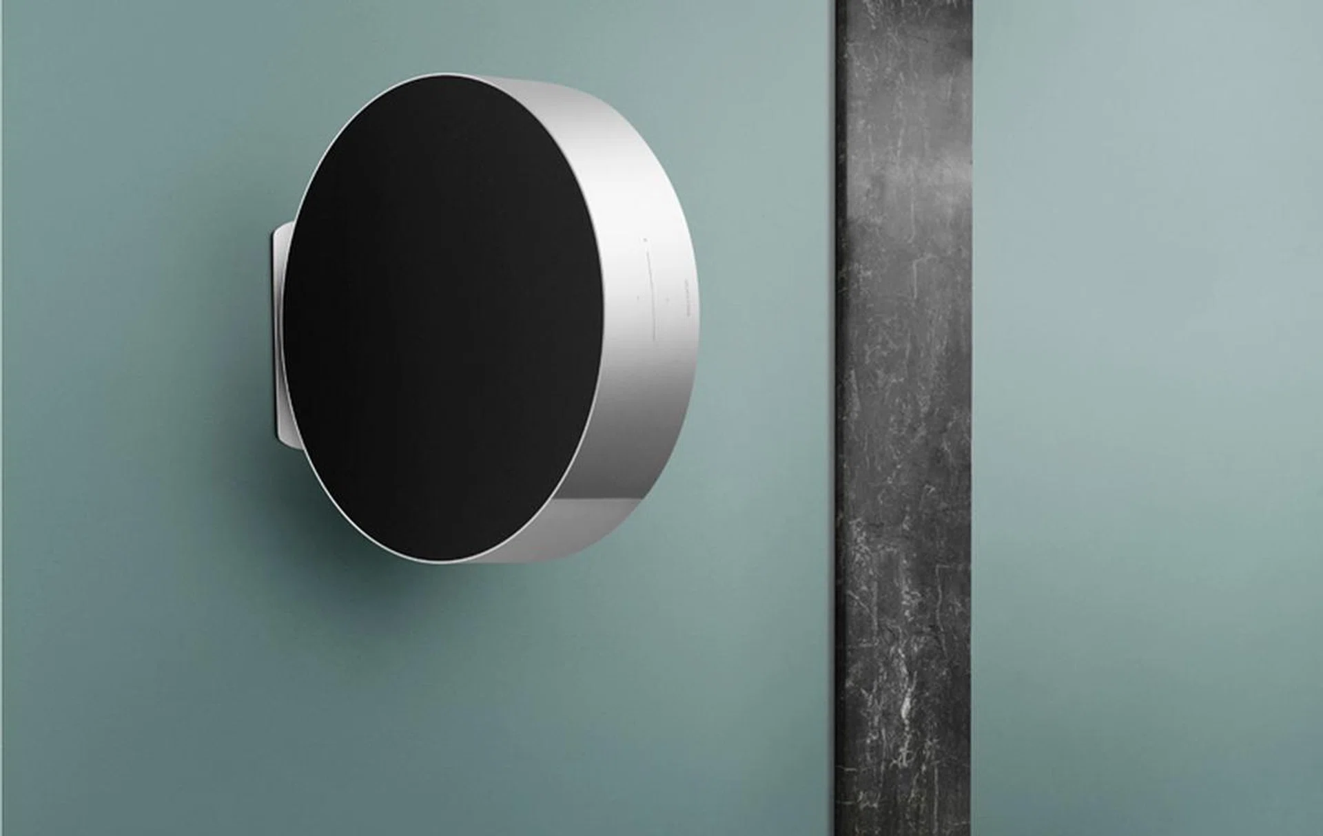 Defying gravity? Even when suspended on the wall, you can still control volume with the force of your touch. According to B&O, the speaker is counterbalanced by a spring that will magically let it return to its centerpoint.