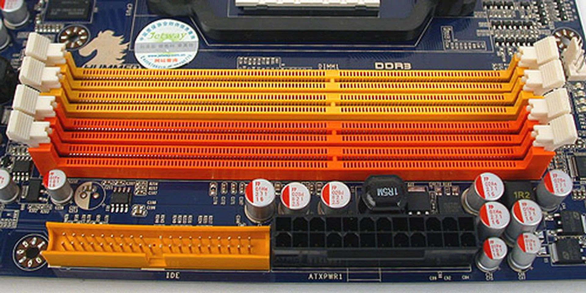 An IDE connector besides the power connector. While it may look like the usual four DIMM dual-channel slots, Jetway states that the maximum memory support is up to 8GB only, which is half that of the typical 890GX.