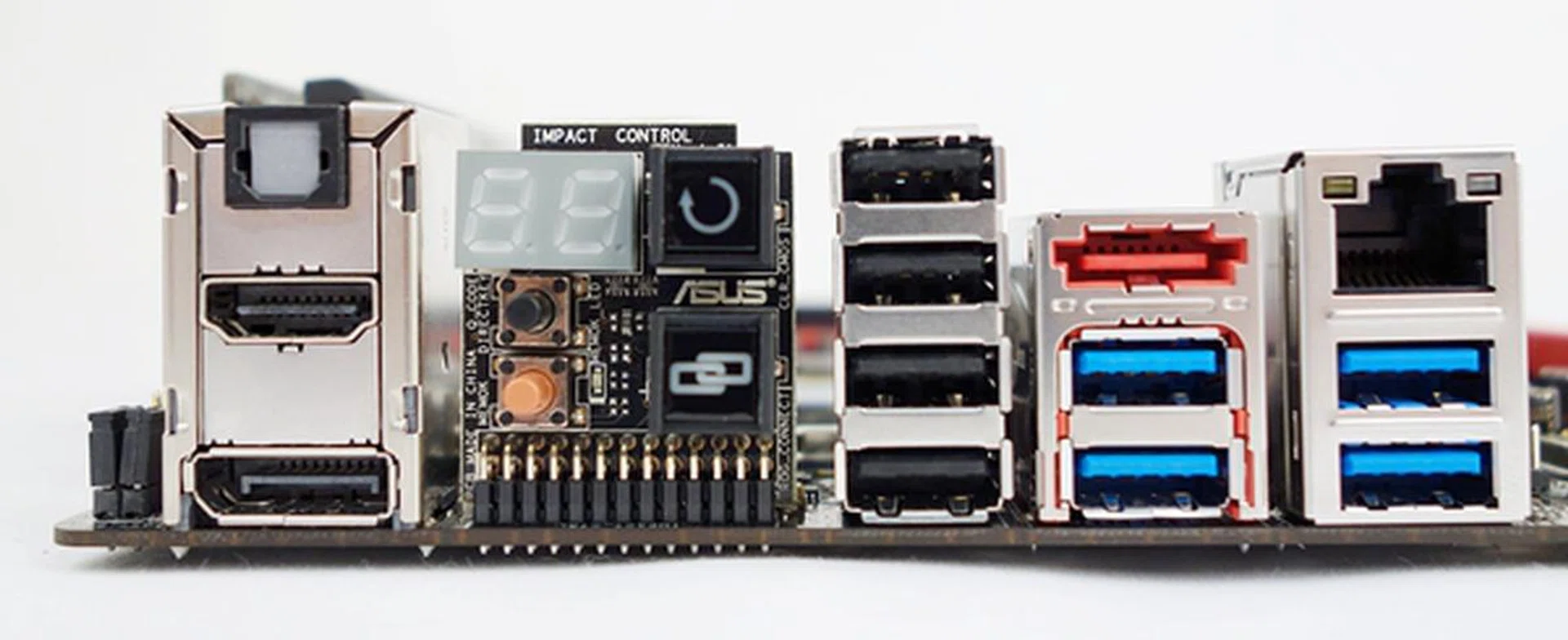 The rear I/O ports of the board, together with the daughter board that hosts a number of onboard buttons and a Q-Code debug LED display.