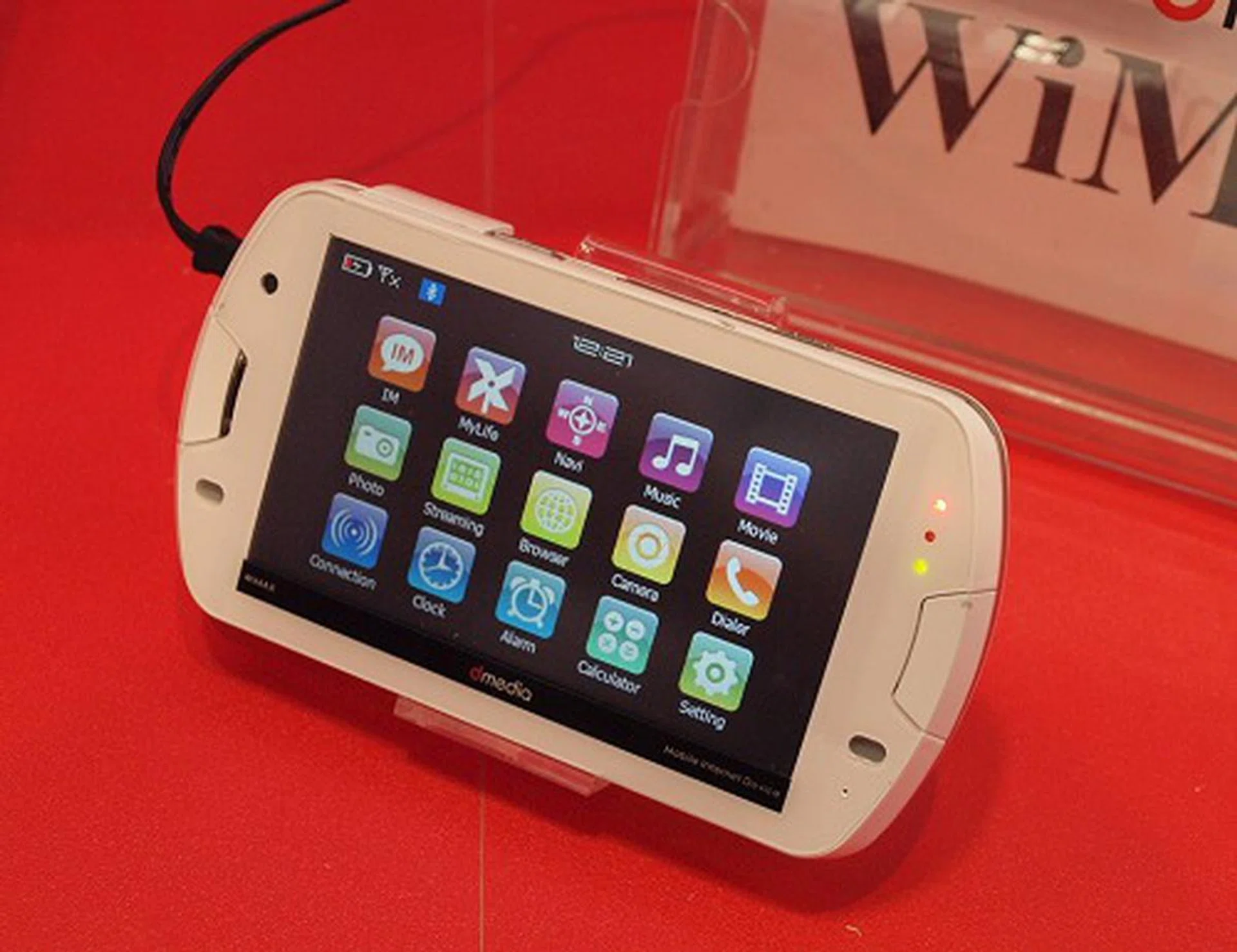  dmedia claims that it has the world's first WiMAX enabled MID device, nicknamed the M0. It has a 4.3-inch touch screen (800x480), uses a Samsung processor which is supported by a Windows CE 6.0 OS, has a 5MP camera and can operate off a tri-band WiMAX frequency range.  