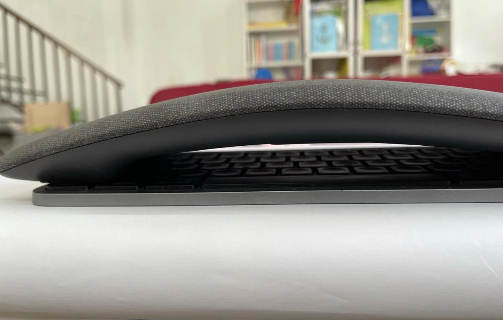 You can see the height the ergonomic arch adds compared to the Logitech MX Keys keyboard. 
