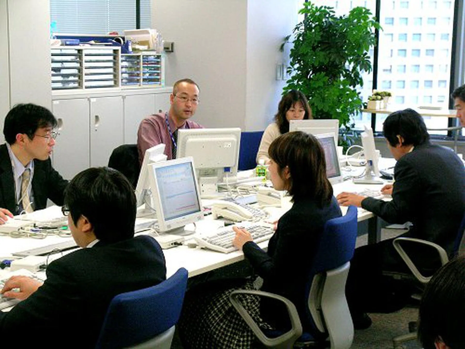 Thin client hooked up to the monitor and phone is all you need to do your job.