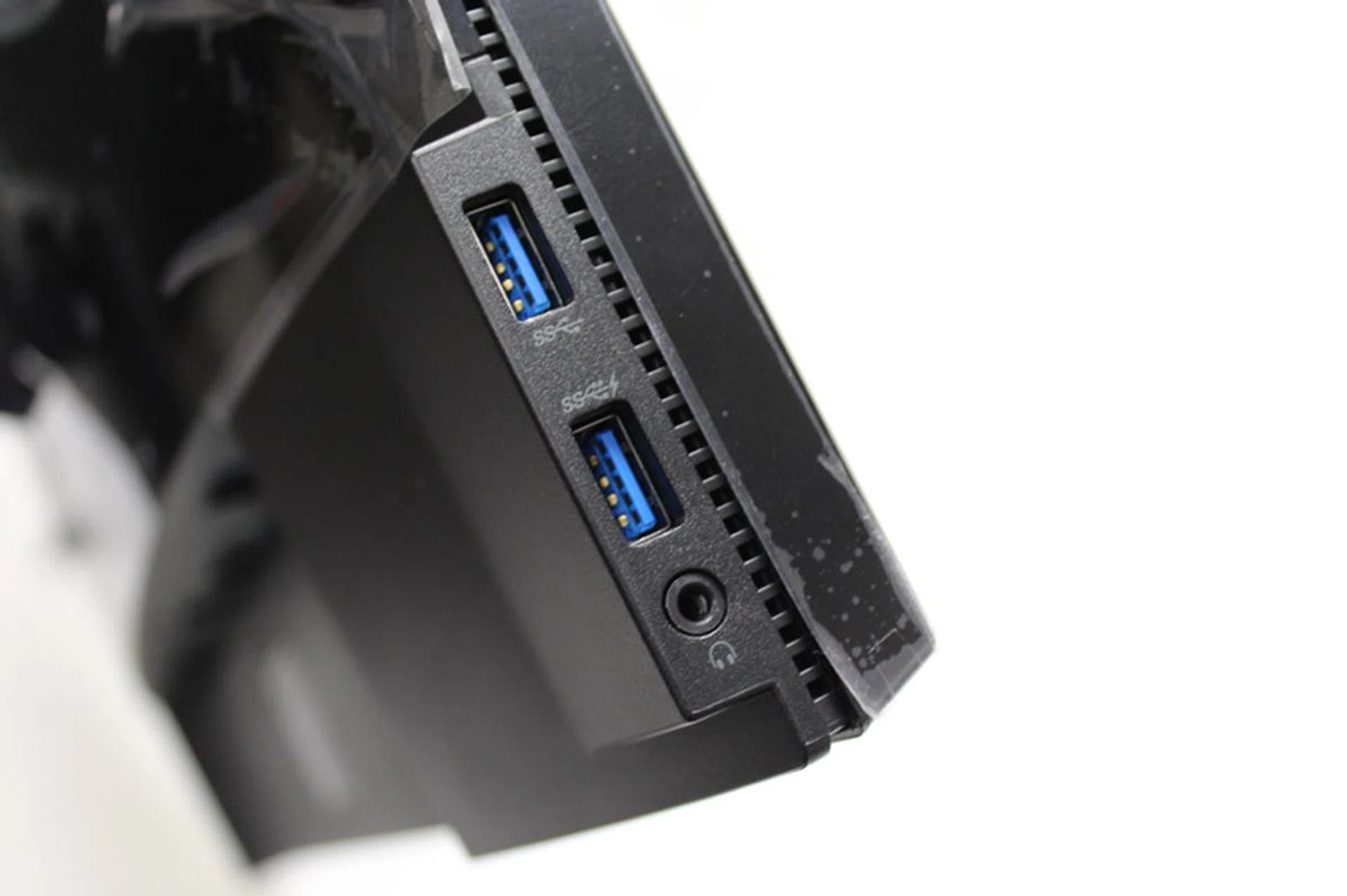 While it doesn't have speakers, there is a headphone jack on the monitor if you want to plug your headphones into it since an HDMI connection can carry audio signals as well. But if you're using a DisplayPort connection, then you're out of luck.