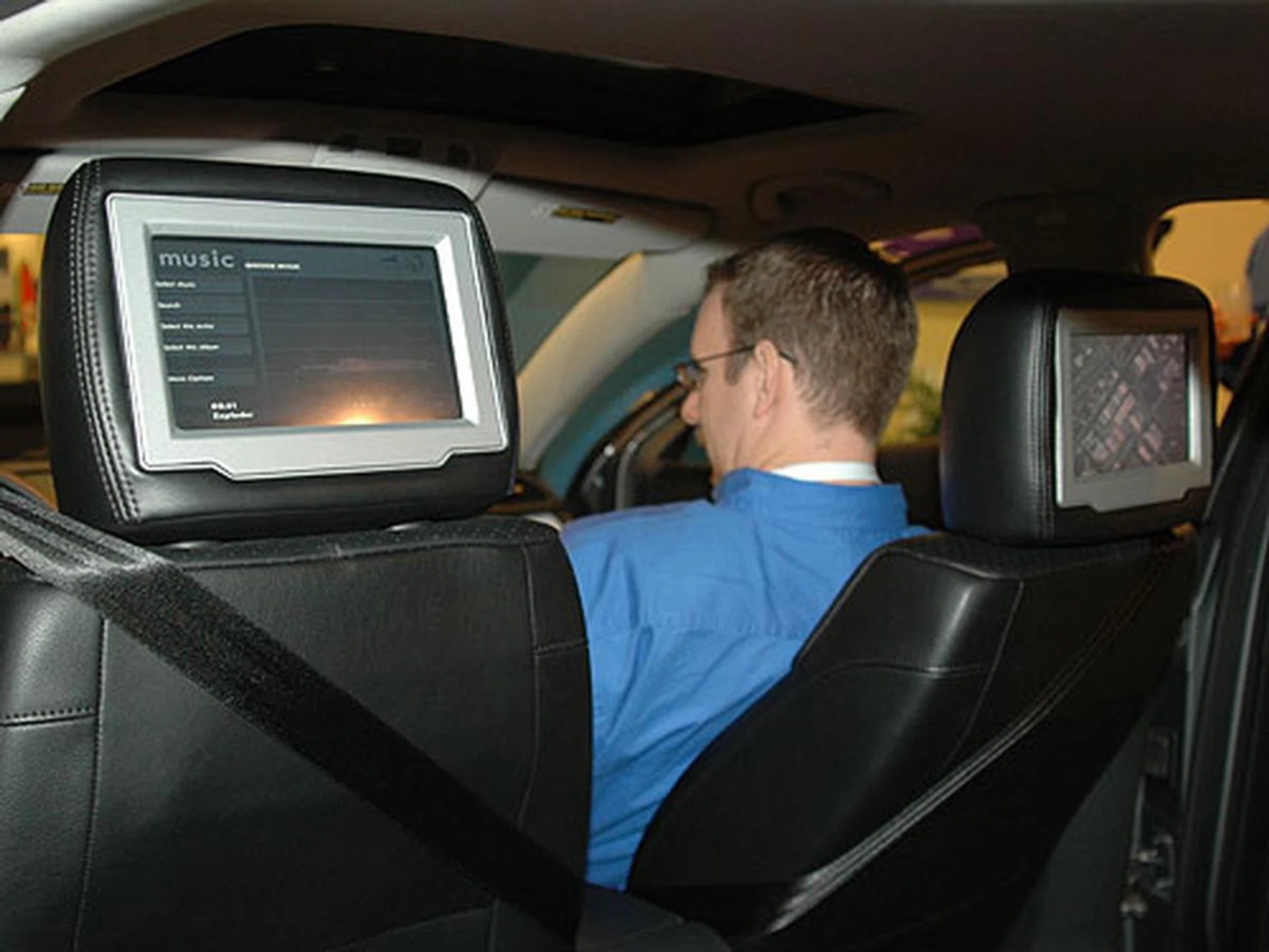 The UMPC can stream different movies to the passengers at the back. It's like flying first class, only that it's now in your car.