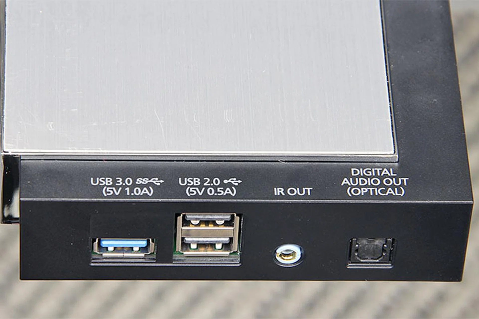 On the side sit more jacks: USB 3.0, USB 2.0 (two of them), IR out, and optical digital audio out.