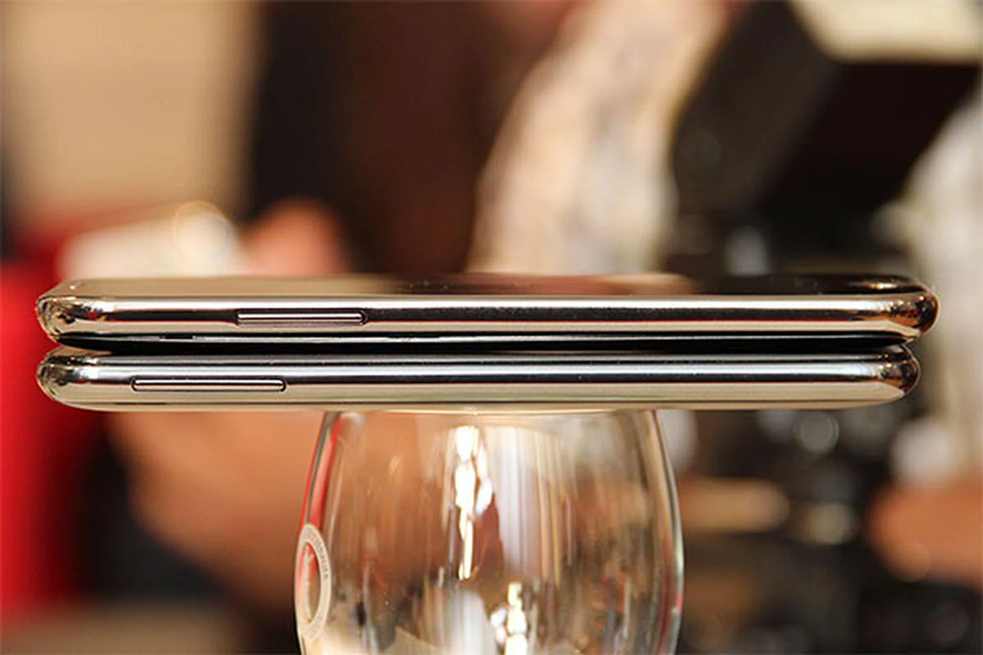 Galaxy Note II (top), original Note (below): You can barely tell the difference between the two devices' thickness, which is good news. As you can see, the volume rocker on the Note II has been shortened. Nonetheless, the tactile feedback has not been affected. 