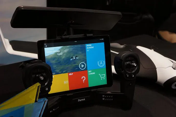 It is best controlled with this optional Parrot Skycontroller, though it's also compatible with an RC controller too. But to get a better range, you'll be better off to invest in Parrot's Skycontroller and a tablet to use as a large viewfinder.