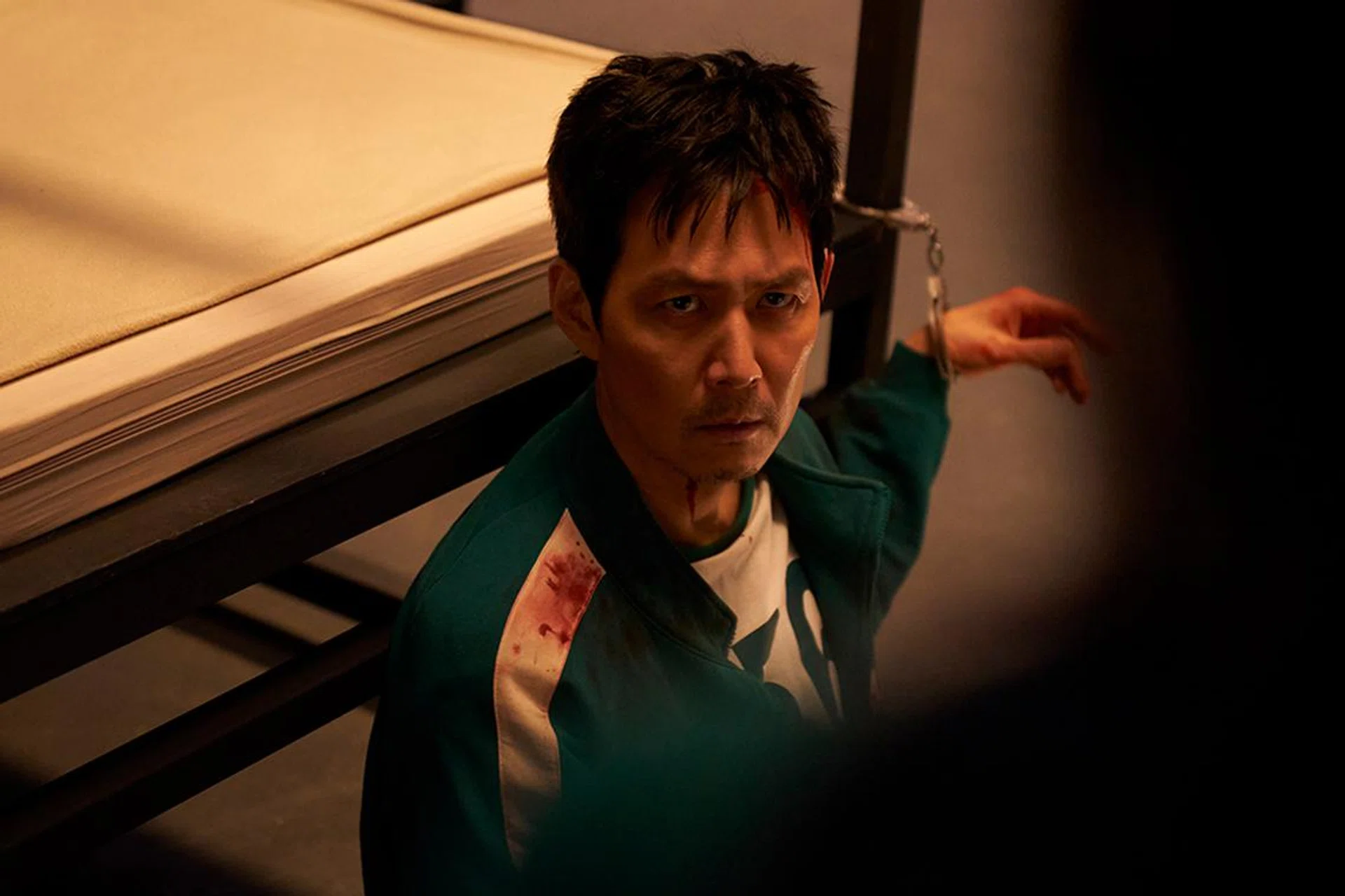 A new still from season 3. Gi-hun doesn't look to be in the best shape after the events of season 2. Photo: Netflix