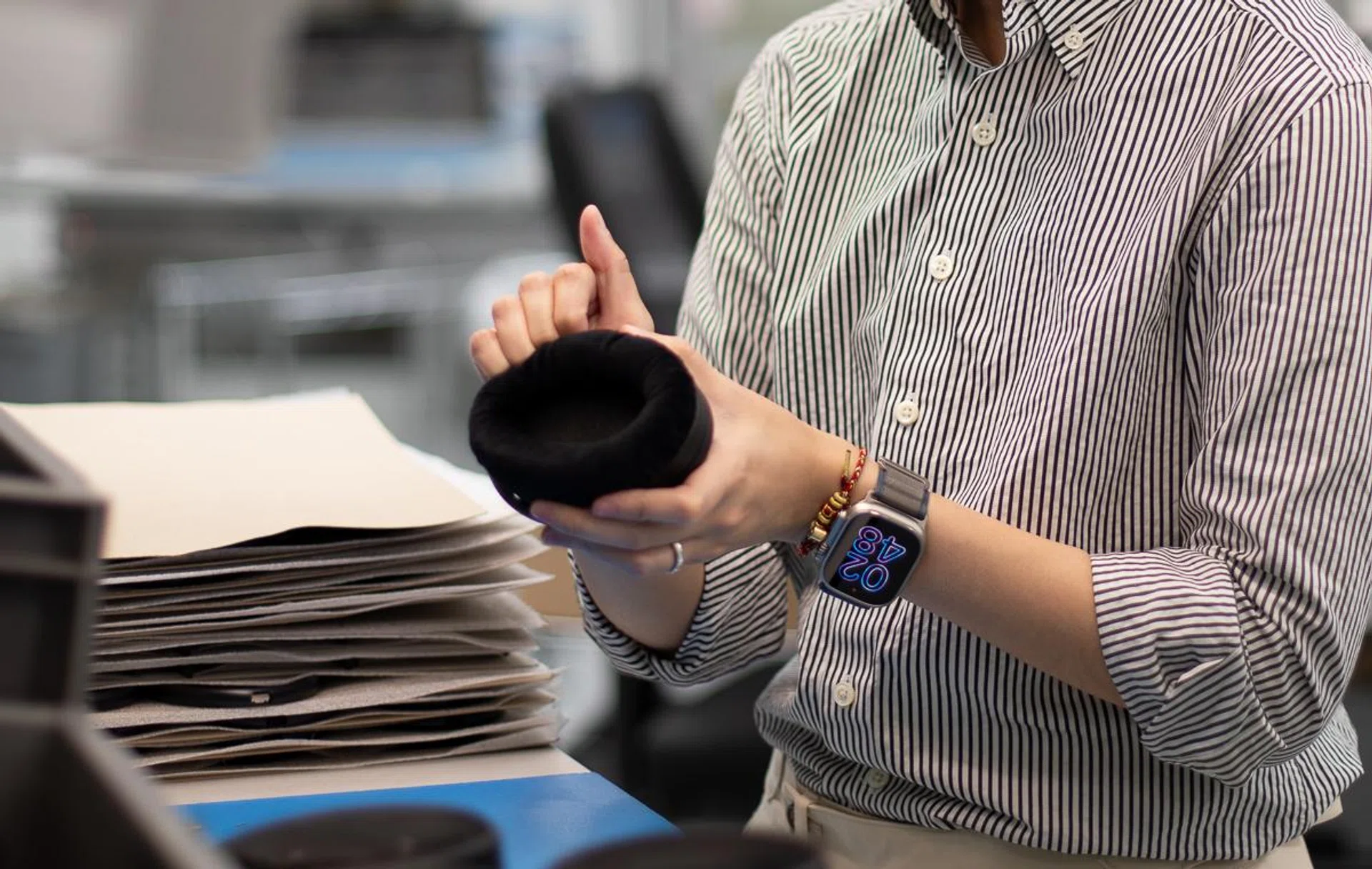 Clipping the earpads into place. Photo: Sennheiser