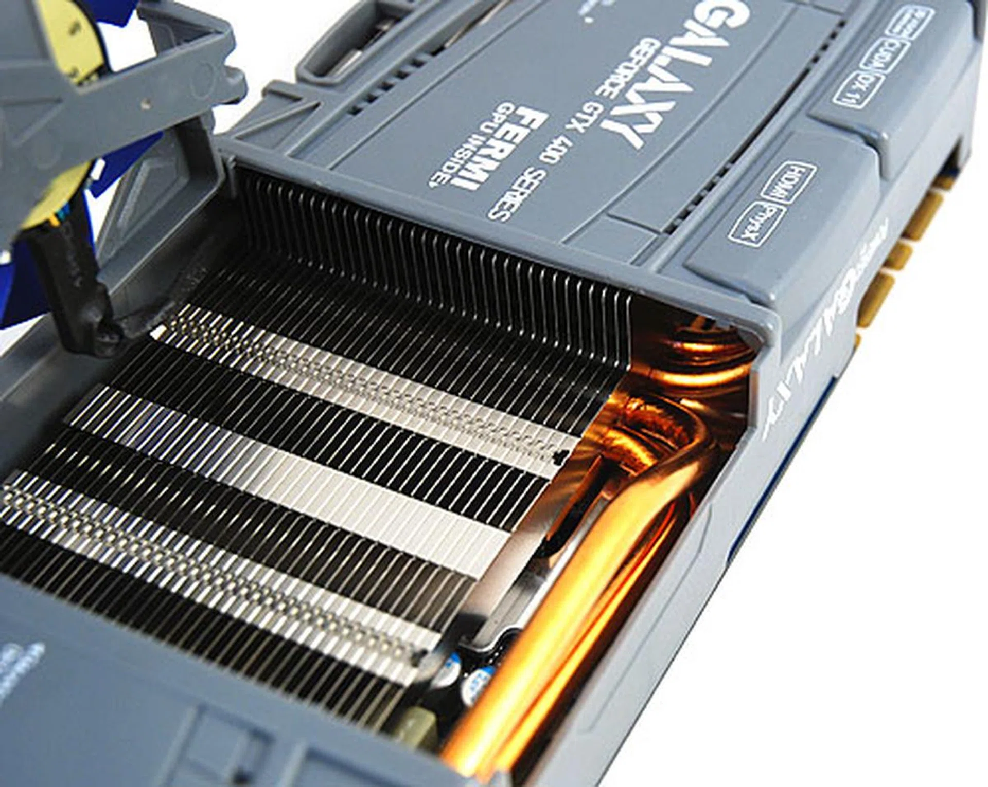 The cooler here no doubt helps to dissipate some of the heat from the chipset, but it also cramps our style (and the CPU socket). 