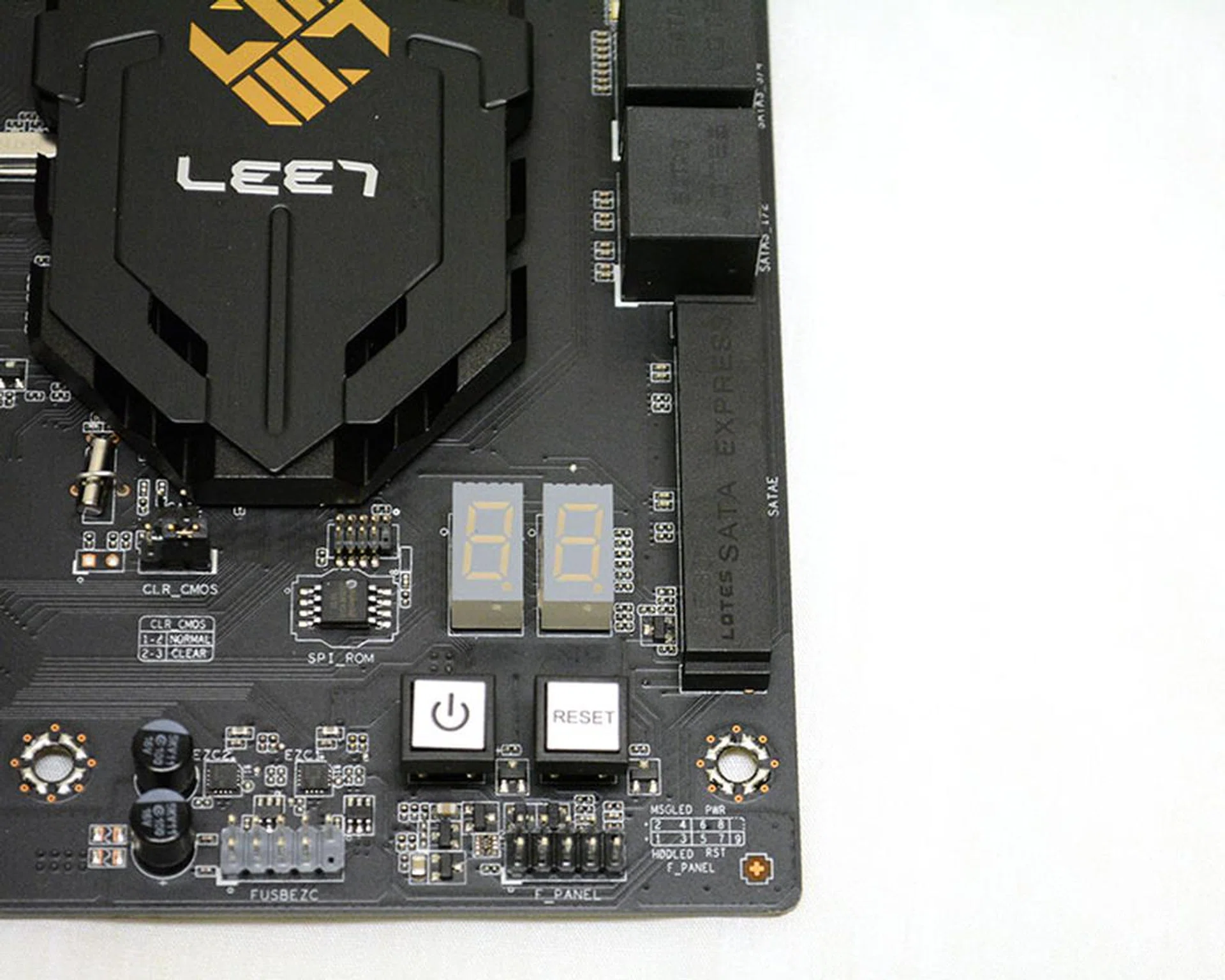 The power and reset buttons and debug LED are located at the bottom right corner of the board.