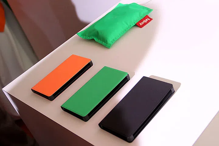 While you can't rip off and replace the rear shell of the Lumia 930, you can get a case for it. Comes in three colors: orange, green, and black.