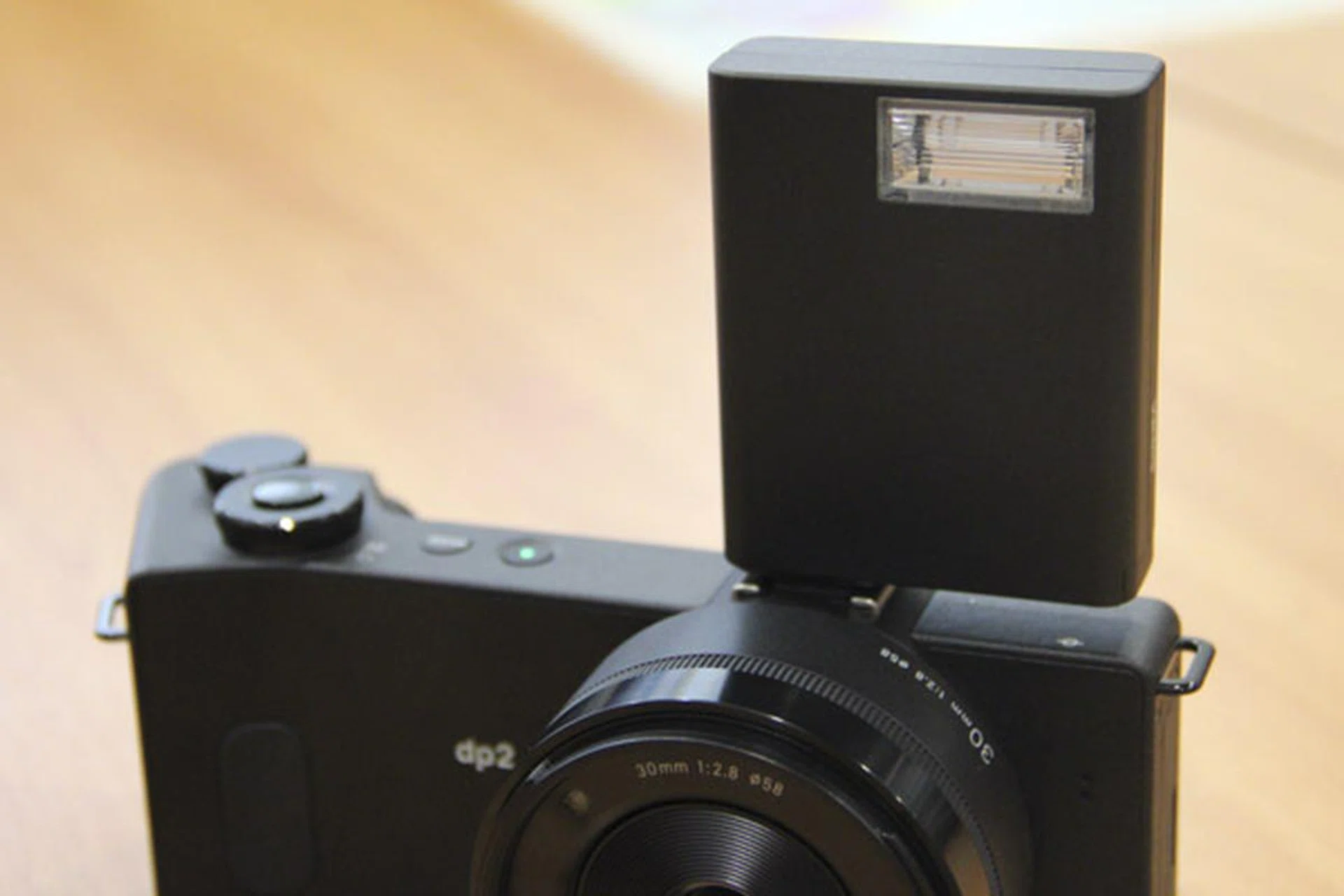 There's an external flash unit you can purchase for the dp Quattro cameras.