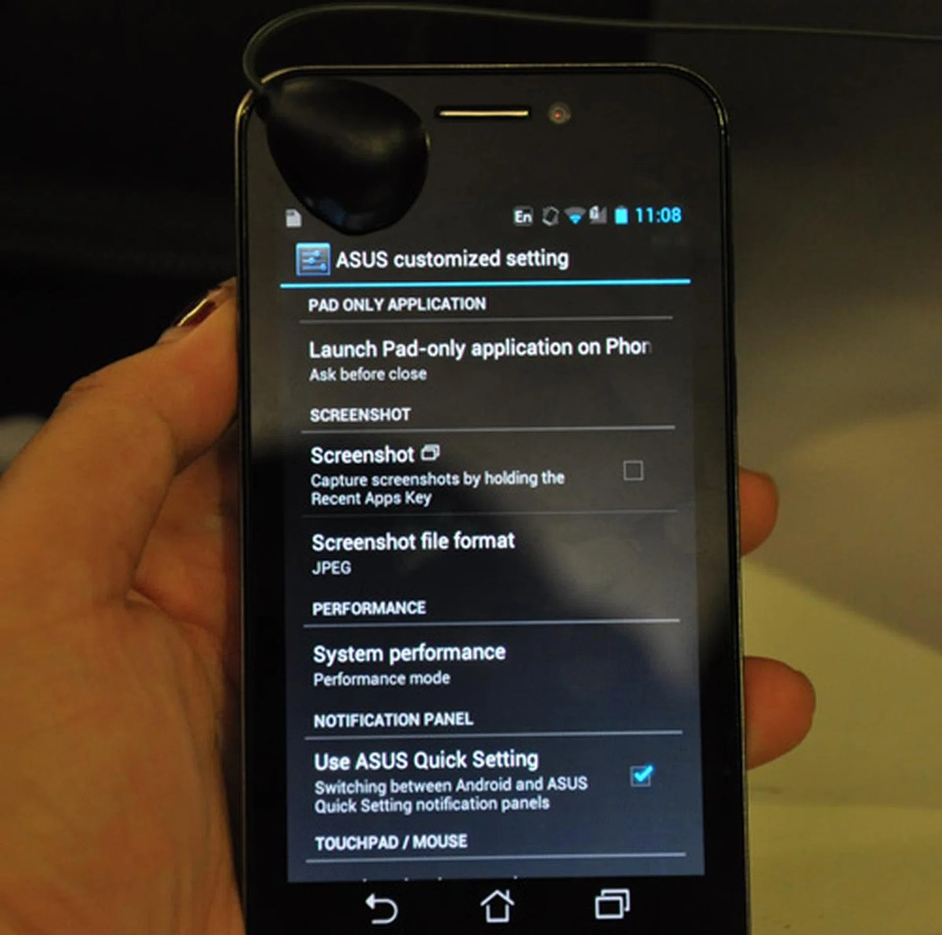 ASUS adds a touch to the PadFone by including its own customized settings, including a launch pad-only application on phone and the option to switch between Android and ASUS quick settings notification panels.