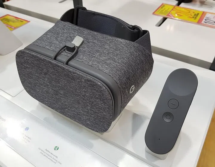 Google's own take of a comfortable and affordable VR headset that's compatible with phones designed with the compatibility of this device in mind. Also seen here is its accompanying controller.