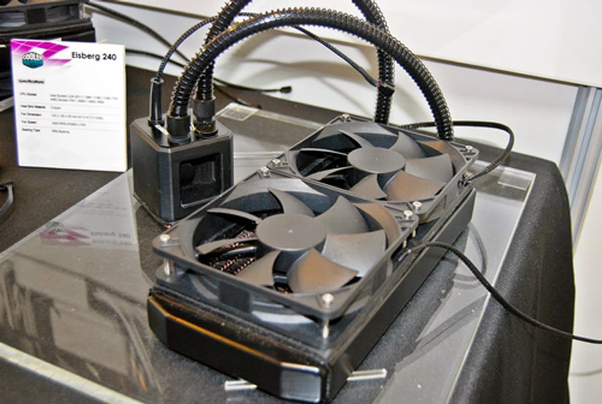 The Eisberg 240 features a dual-120mm fan-cooled radiator; hence, its 240-moniker that reflects this fact. The fitting over the CPU features a transparent window.