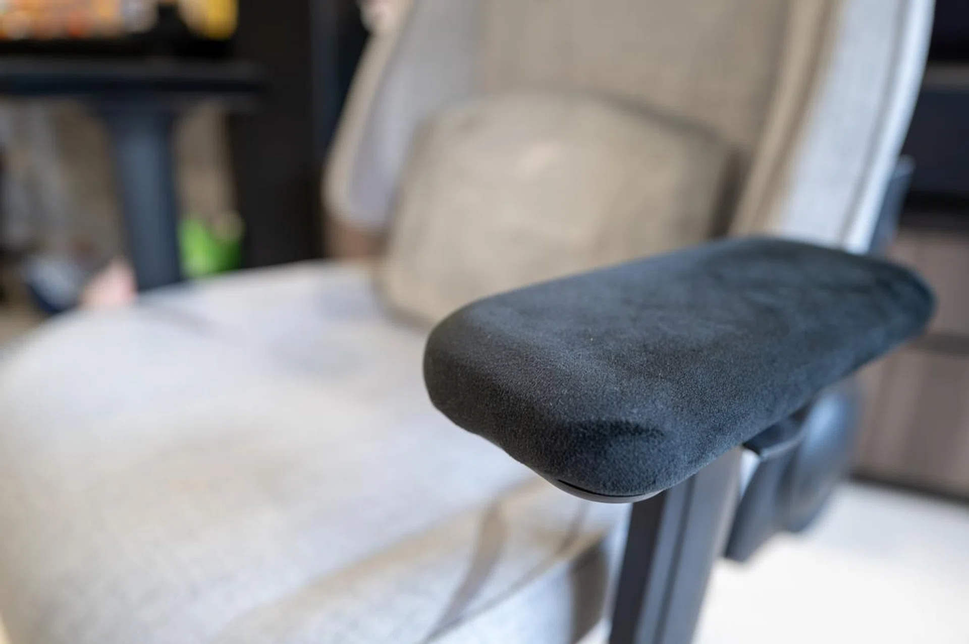 The adjustable armrests are foam padded.