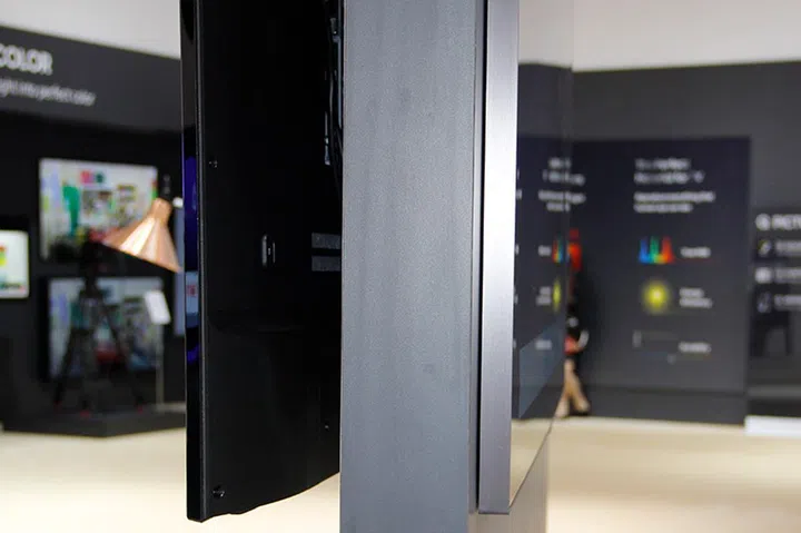 The end result (right) is a TV that can go flush against the wall when it's mounted.