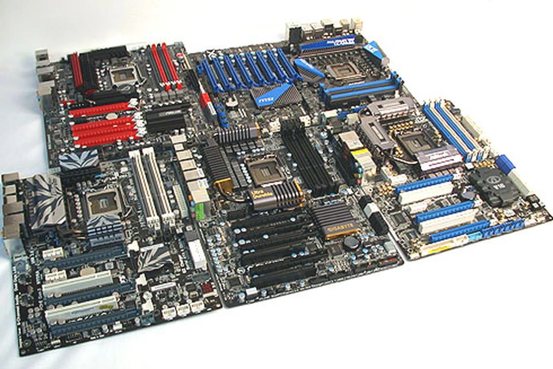 One expects these high-end boards to be larger than life (or ATX) and two of them (the top row) are exactly that. The ASUS comes in an Extended ATX form factor while the MSI board took it further with an even larger XL-ATX form factor.