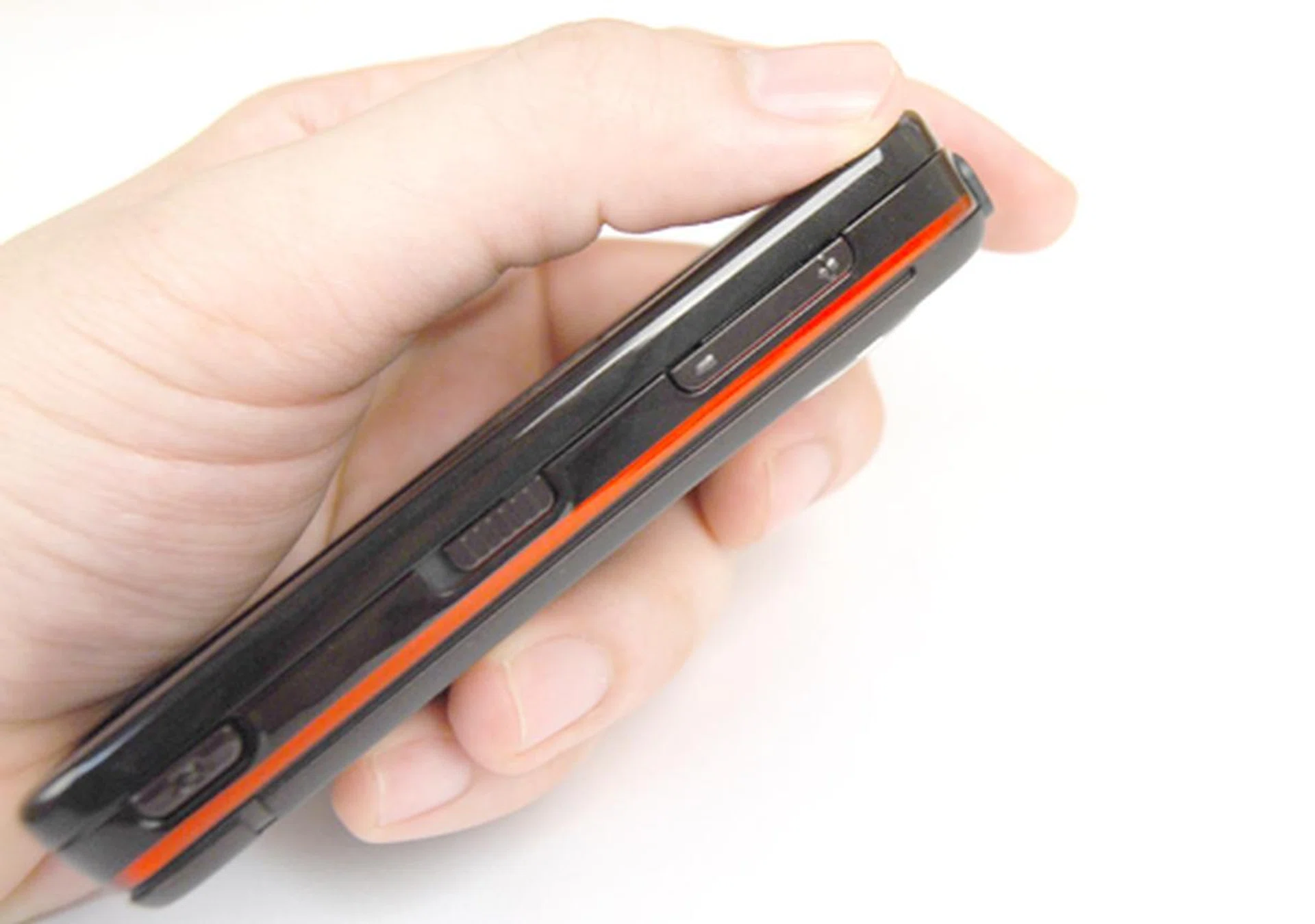 Whether it's a touchscreen device or not, having a dedicated keyguard button (or slider in this case) will do wonders to your user experience (such as less accidental phone calls).