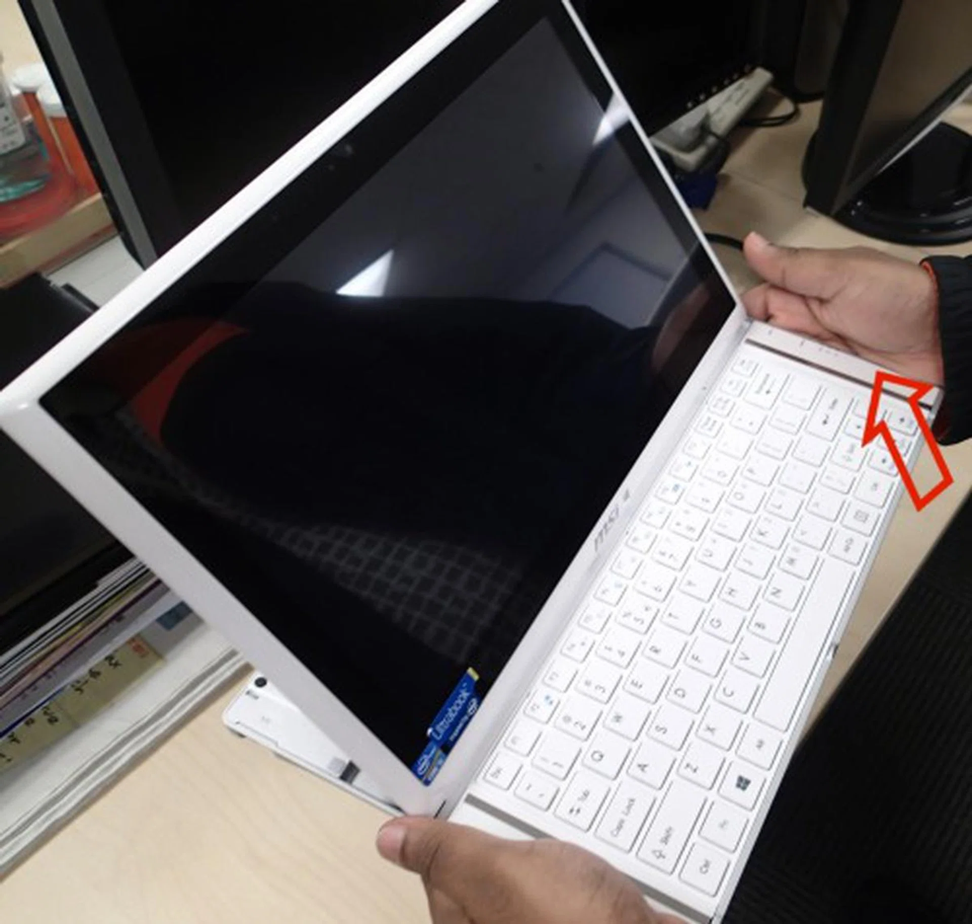 As indicated, the power button of the device is located on the side just where you would usually place your hands to handle the device. The only time you won't be handling such is when you're using it on the table. As such, this issue persists how ever you handle the device - be it in tablet or notebook form factor.