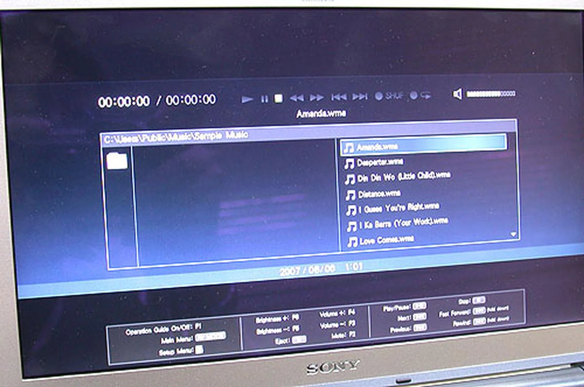 Yup, we could play our MP3s, DVDs/CDs and images through this media-centric interface. The keyboard and AV Mode buttons are used to make your selections. However, we found the buttons a bit too small and you may have to press a few times to get it to respond as intended. The interface too is relatively simple. It's not perfect, though nothing serious was encountered. 